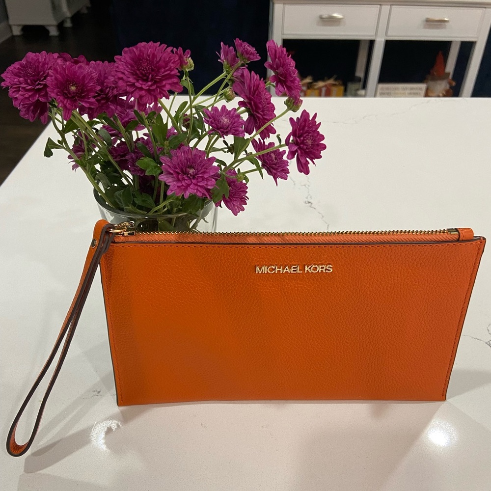Michael Kors Orange Wristlet New Go Vols!